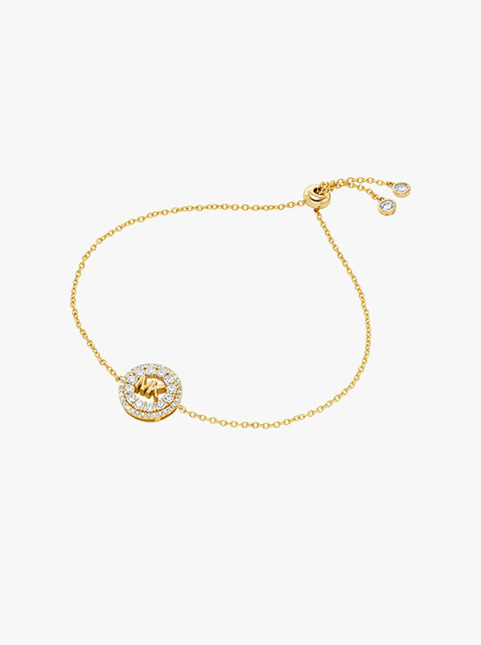 michael kors سوار منزلق بشعارالماركة مرصع من الفضة الإسترلينية المطلي بالروديوم