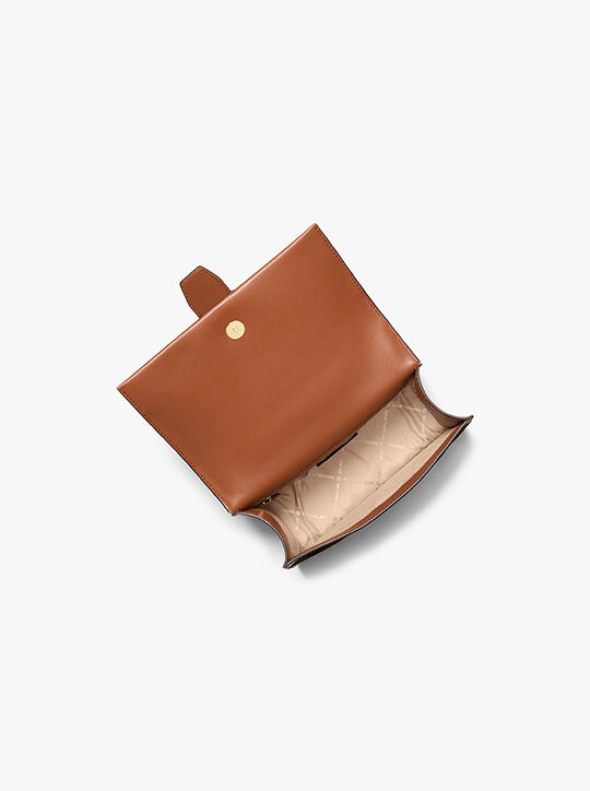 حقيبة كروس غرينتش صغيرة من جلد سافيانو michael kors حقيبة كروس غرينتش صغيرة من جلد سافيانو