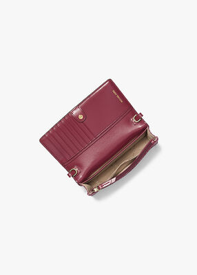 michael kors jet set small logo print woven smartphone crossbody bag