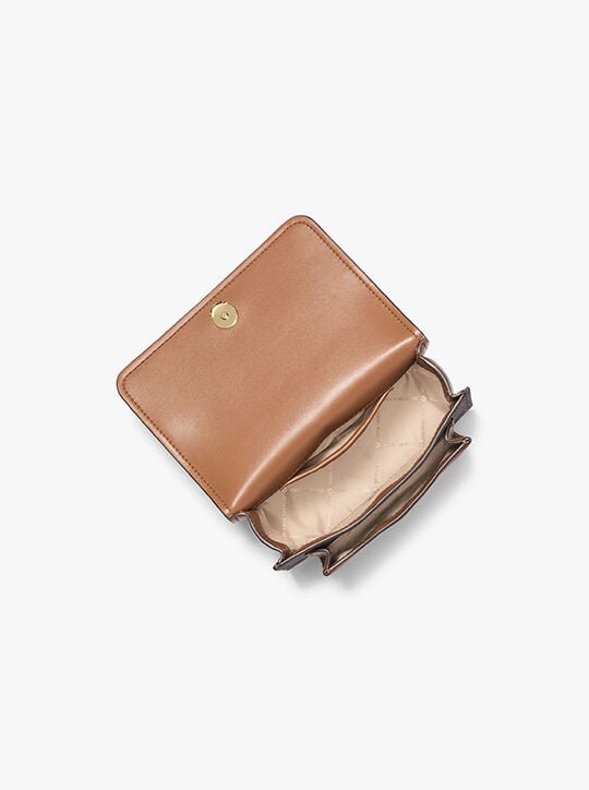 حقيبة كروس كلير صغيرة michael kors حقيبة كروس كلير صغيرة