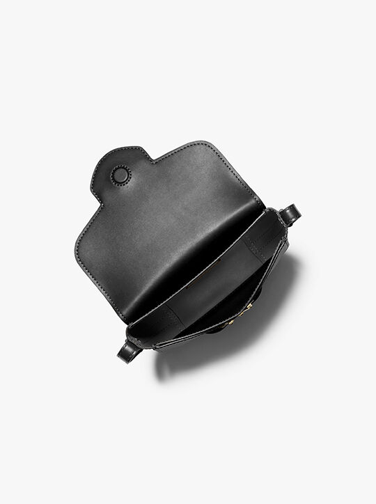 حقيبة كروس ريد صغيرة جلدية مرصعة بالحصى michael kors حقيبة كروس ريد صغيرة جلدية مرصعة بالحصى