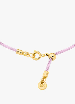 michael kors pav  gold tone logo corded bracelet