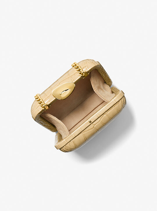 الميناوديير جلد تمساح منقوش من تينا michael kors الميناوديير جلد تمساح منقوش من تينا