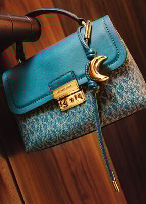 michael kors crescent moon bag charm