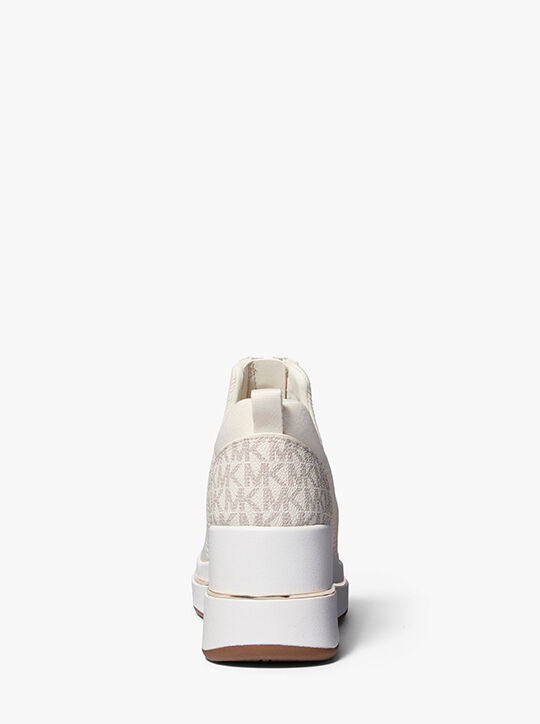 michael kors حذاء رياضي إيمي بكعب إسفين بسحاب شبكي