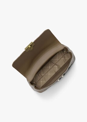 michael kors حقيبة تريبيكا الجلدية المبطنة متوسطة الحجم