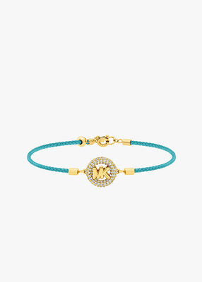 michael kors pav  gold tone logo corded bracelet