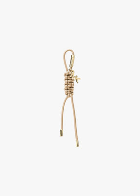 michael kors gold tone and braided cord bag charm