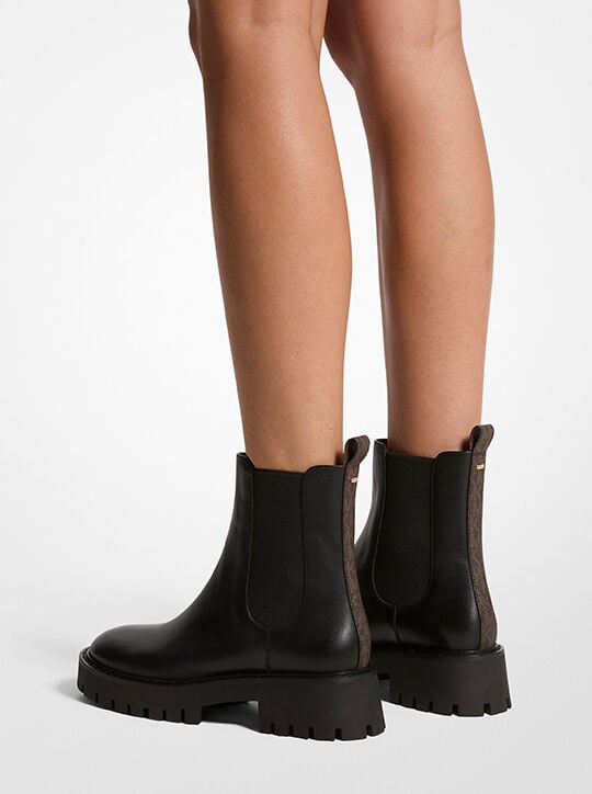 حذاء آشر للكاحل من الجلد michael kors حذاء آشر للكاحل من الجلد