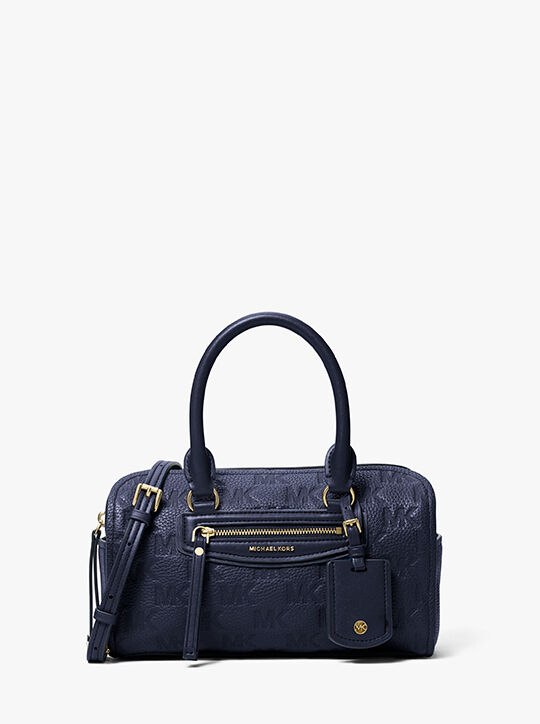 حقيبة كروس جيت سيت ترافيل صغيرة جدًا من الجلد المنقوش michael kors حقيبة كروس جيت سيت ترافيل صغيرة جدًا من الجلد المنقوش