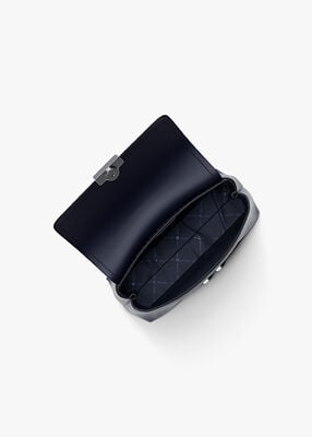 michael kors حقيبة تريبيكا صغيرة جدًا بشعار الماركة