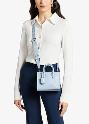 michael kors mirella extra small logo embossed leather crossbody bag