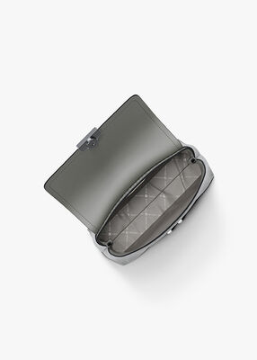 michael kors حقيبة تريبيكا صغيرة جدًا بشعار الماركة