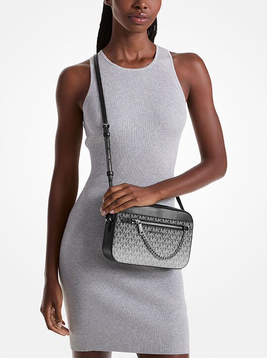 حقيبة كروس بودي جيت سيت كبيرة بشعار الماركة michael kors حقيبة كروس بودي جيت سيت كبيرة بشعار الماركة