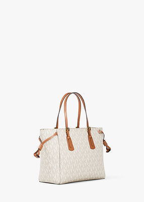 michael kors voyager extra small signature logo convertible crossbody bag