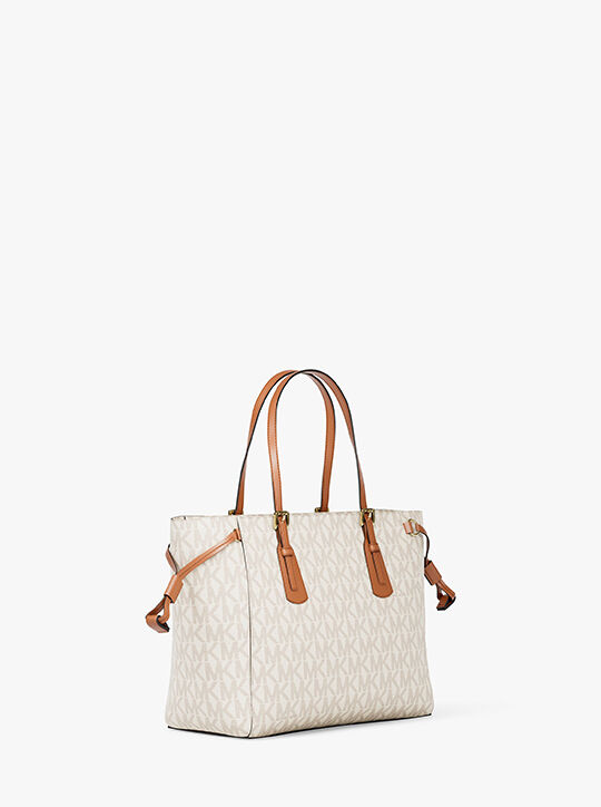 michael kors voyager extra small signature logo convertible crossbody bag