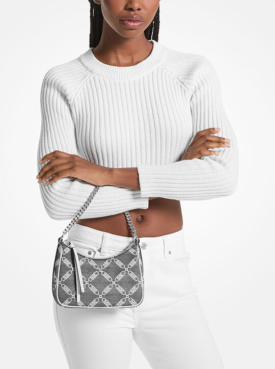 حقيبة جيت سيت صغيرة بشعار الماركة جاركة michael kors حقيبة جيت سيت صغيرة بشعار الماركة جاركة