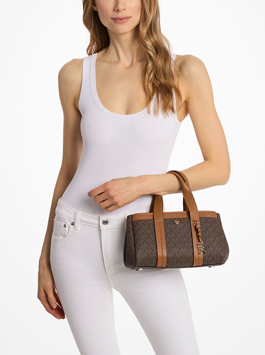 حقيبة كروس بودي رومي صغيرة جدًا بشعار الماركة michael kors حقيبة كروس بودي رومي صغيرة جدًا بشعار الماركة