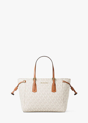 michael kors voyager extra small signature logo convertible crossbody bag