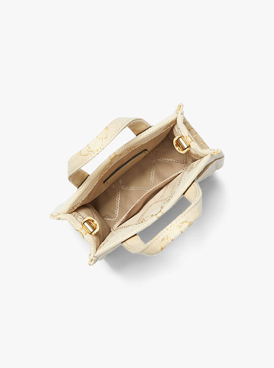 michael kors gigi extra small metallic empire logo jacquard crossbody bag