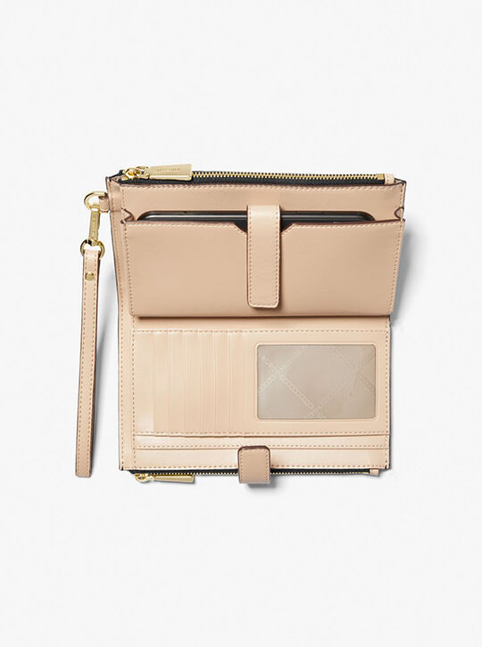 michael kors jet set large logo embossed metallic smartphone wristlet