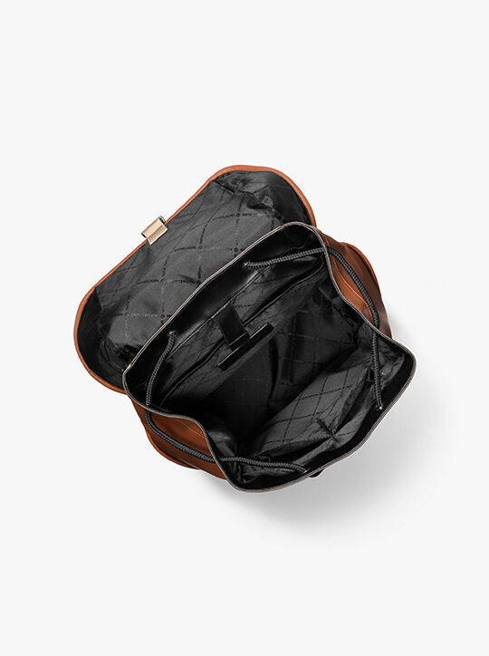 حقيبة ظهر كوبر سبورت من الجلد المرصع بالحصى michael kors حقيبة ظهر كوبر سبورت من الجلد المرصع بالحصى