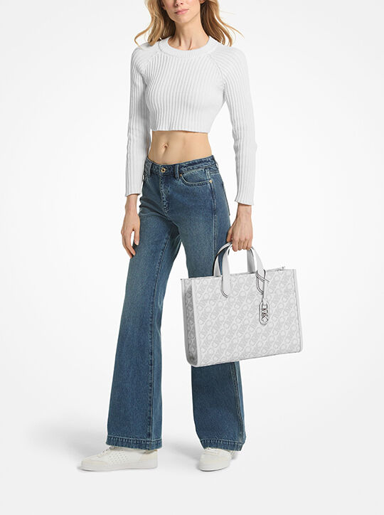 حقيبة حمل جيجي كبيرة بشعار إمباير michael kors حقيبة حمل جيجي كبيرة بشعار إمباير