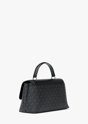 michael kors حقيبة تريبيكا صغيرة جدًا بشعار الماركة