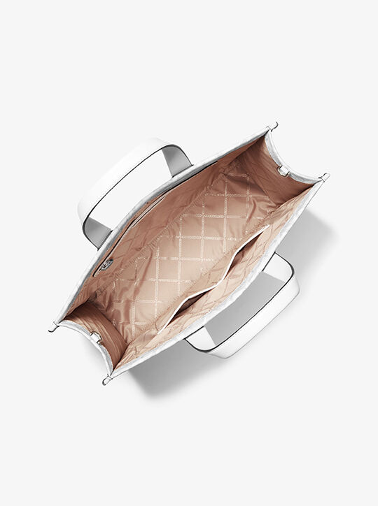 حقيبة حمل جيجي كبيرة بشعار إمباير michael kors حقيبة حمل جيجي كبيرة بشعار إمباير