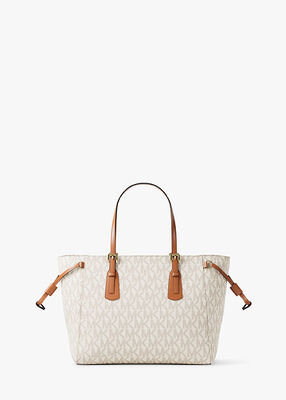 michael kors voyager extra small signature logo convertible crossbody bag