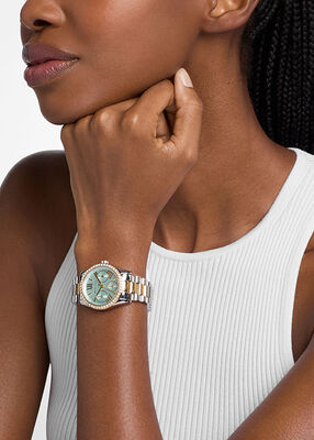 michael kors ساعة ليكسينغتون بافيه ثنائية اللون