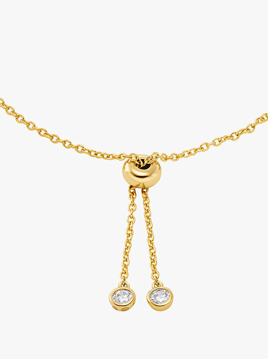 michael kors سوار منزلق بشعارالماركة مرصع من الفضة الإسترلينية المطلي بالروديوم